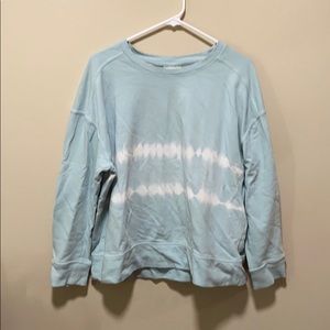 Thin light blue crew neck.